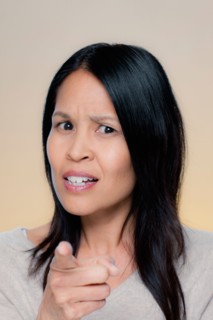 Portrait of angry woman. Photo : Rob Lewine