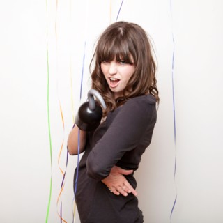 Studio Shot of young woman with hook. Photo : Jessica Peterson
