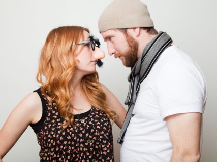 Studio Shot of three people dressed up in animal noses and sombrero. Photo : Jessica Peterson