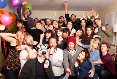 Group portrait at party. Photo : Jessica Peterson