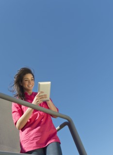 Young woman using tablet pc.