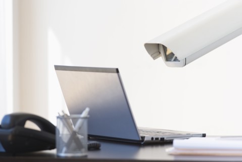 Cctv camera over laptop.