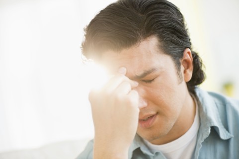 Man with headache.