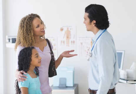 Mother with daughter (12-13) visiting pediatrician.