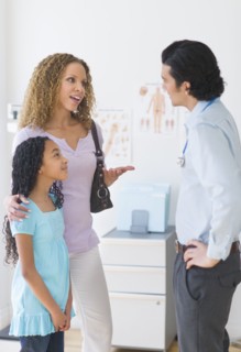 Mother with daughter (12-13) visiting pediatrician.