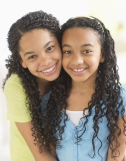 Portrait of two sisters (10-13).