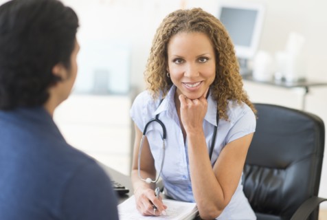 Doctor and patient in clinic.