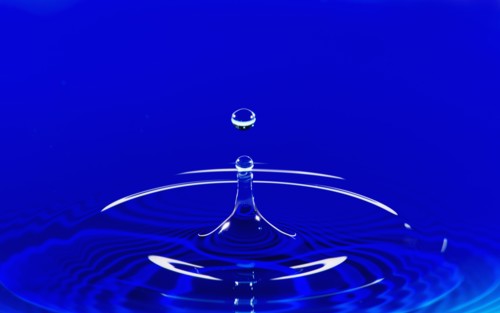Blue water splashing.