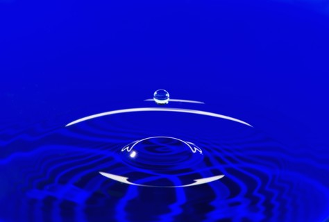 Blue water splashing.