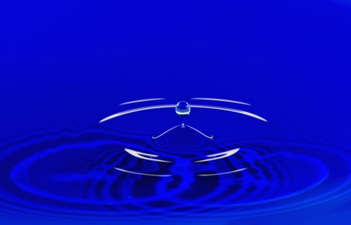 Blue water splashing.