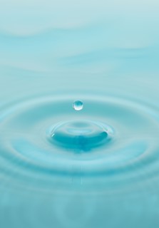 Drop falling into water.