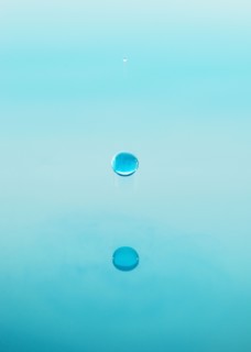 Drop falling into water.