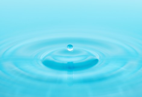 Drop falling into water.