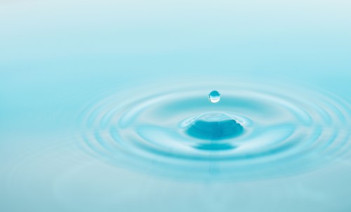 Drop falling into water.