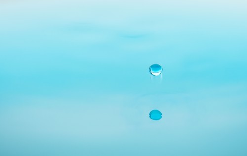 Drop falling into water.
