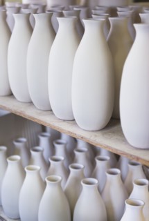 USA, New Jersey, Jersey City, Pottery on shelves.
