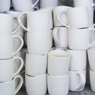 USA, New Jersey, Jersey City, Pottery on shelves.