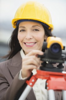 Architect using theodolite.