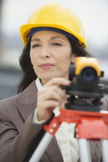 Architect using theodolite.