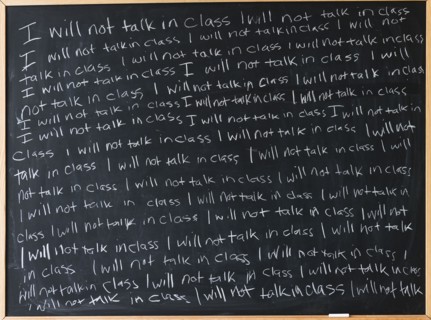 Blackboard with writing lines. 
Photo : Jamie Grill