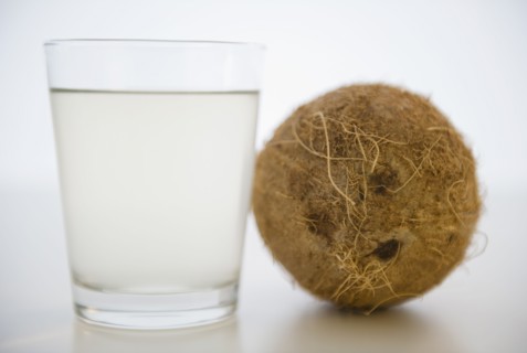 Coconut water in glass. 
Photo : Jamie Grill