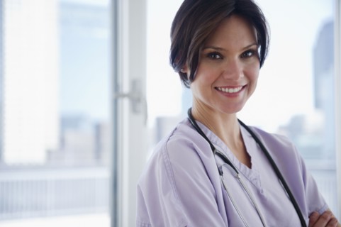 Portrait of female nurse. 
Photo: Jamie Grill