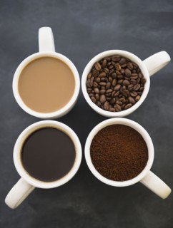 Close up coffee cups with coffee and roast coffee beans. 
Photo : Jamie Grill