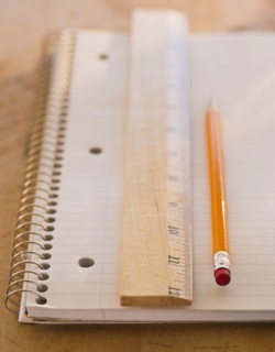 Close up of notebook, ruler and pencil, studio shot. 
Photo: Daniel Grill