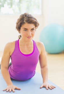 Woman practicing yoga. 
Photo : Daniel Grill