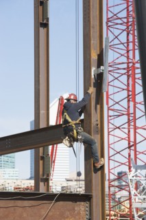 USA, New York, Long Island, New York City, Male worker on construction site. 
Photo: fotog
