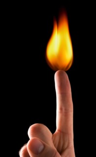 Index finger with flame. 
Photo: Mike Kemp