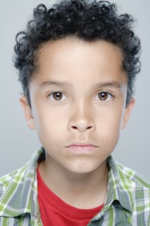Portrait of boy (8-9), studio shot. 
Photo : Rob Lewine
