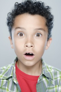 Portrait of boy (8-9), studio shot. 
Photo: Rob Lewine