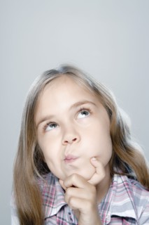 Portrait of girl (6-7), studio shot. 
Photo : Rob Lewine