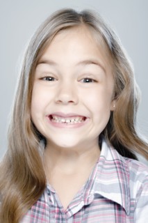 Portrait of girl (6-7), studio shot. 
Photo : Rob Lewine
