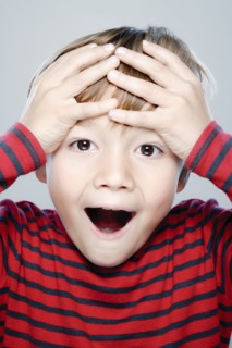 Portrait of boy (6-7), studio shot. 
Photo : Rob Lewine