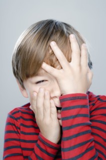 Portrait of boy (6-7), studio shot. 
Photo : Rob Lewine