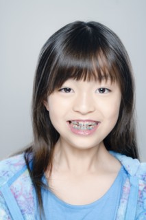 Portrait of girl (8-9), studio shot. 
Photo : Rob Lewine