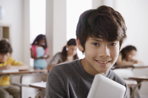 Portrait of schoolboy (12-13). 
Photo : Rob Lewine