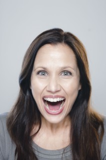 Portrait of mature woman, studio shot. 
Photo : Rob Lewine