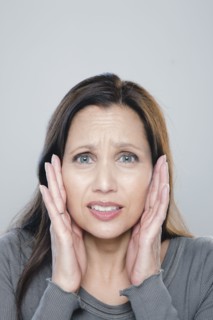 Portrait of mature woman, studio shot. 
Photo : Rob Lewine