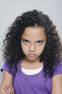 Portrait of girl (10-11), studio shot. 
Photo : Rob Lewine
