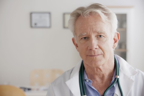 Portrait of senior doctor. 
Photo : Rob Lewine
