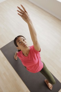 Young woman exercising. 
Photo : Rob Lewine