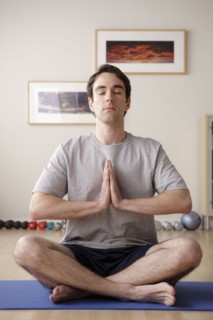 Young man meditating. 
Photo : Rob Lewine