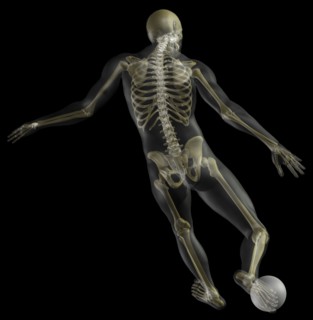 Digitally generated image of human representation playing soccer ball with human skeleton visible.