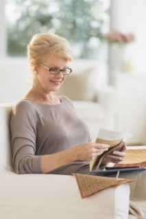 Woman looking at textile swatches.