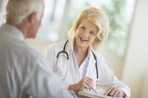Female and male doctors talking.