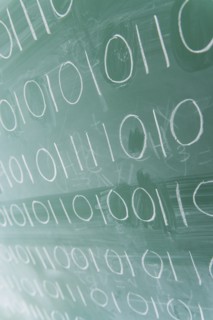 Binary code on blackboard.