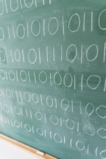 Binary code on blackboard.